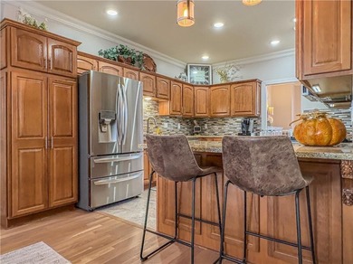 This beautifully maintained 4-bedroom, 3-bath home is located in on Harrison Country Club in Arkansas - for sale on GolfHomes.com, golf home, golf lot