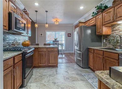 This beautifully maintained 4-bedroom, 3-bath home is located in on Harrison Country Club in Arkansas - for sale on GolfHomes.com, golf home, golf lot