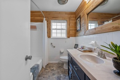Enjoy resort-style living on the 11th green of Diamondhead Golf on Diamondhead Golf and Country Club in Arkansas - for sale on GolfHomes.com, golf home, golf lot