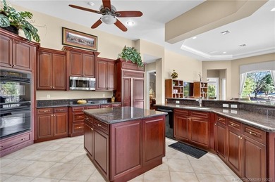 With over 3600 sq ft, this 1-story Toll Brothers built home on Palm Cove Golf and Yacht Club in Florida - for sale on GolfHomes.com, golf home, golf lot