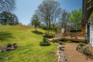 Enjoy resort-style living on the 11th green of Diamondhead Golf on Diamondhead Golf and Country Club in Arkansas - for sale on GolfHomes.com, golf home, golf lot