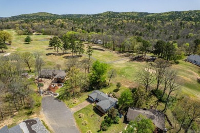 Enjoy resort-style living on the 11th green of Diamondhead Golf on Diamondhead Golf and Country Club in Arkansas - for sale on GolfHomes.com, golf home, golf lot