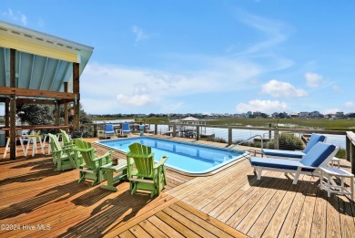 Welcome to waterfront living on Big Davis Canal! Looking out on Founders Club At St. James Plantation in North Carolina - for sale on GolfHomes.com, golf home, golf lot