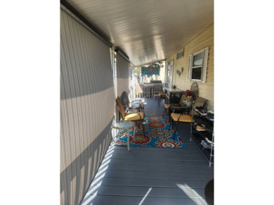 Being Sold Below Market Value!  1986 1/1 in pristine condition on Largo Golf Course in Florida - for sale on GolfHomes.com, golf home, golf lot