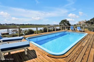 Welcome to waterfront living on Big Davis Canal! Looking out on Founders Club At St. James Plantation in North Carolina - for sale on GolfHomes.com, golf home, golf lot