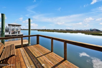 Welcome to waterfront living on Big Davis Canal! Looking out on Founders Club At St. James Plantation in North Carolina - for sale on GolfHomes.com, golf home, golf lot