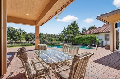 With over 3600 sq ft, this 1-story Toll Brothers built home on Palm Cove Golf and Yacht Club in Florida - for sale on GolfHomes.com, golf home, golf lot