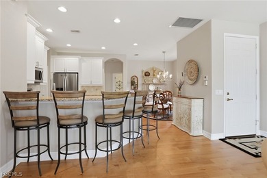 Welcome to this beautifully updated attached villa in the highly on Pelican Preserve Golf Club in Florida - for sale on GolfHomes.com, golf home, golf lot