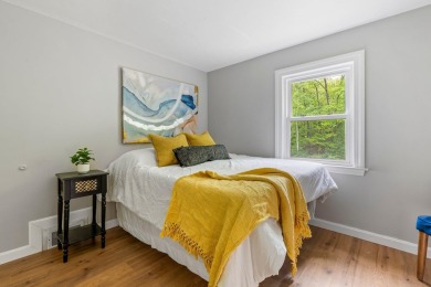 Nestled on a quiet dead-end street, this beautifully updated on Bolduc Park Golf Course in New Hampshire - for sale on GolfHomes.com, golf home, golf lot