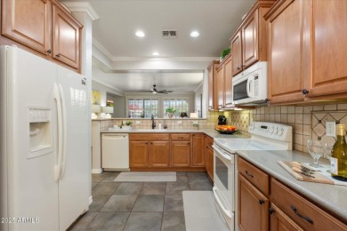 This gated 55+ community is nestled within the mountains and on The Golf Club At Johnson Ranch in Arizona - for sale on GolfHomes.com, golf home, golf lot