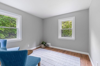 Nestled on a quiet dead-end street, this beautifully updated on Bolduc Park Golf Course in New Hampshire - for sale on GolfHomes.com, golf home, golf lot