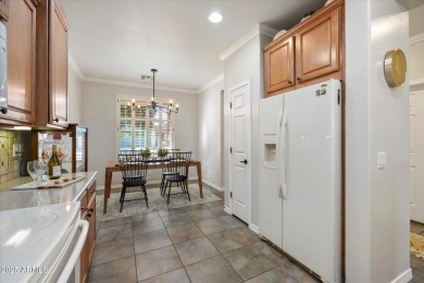 This gated 55+ community is nestled within the mountains and on The Golf Club At Johnson Ranch in Arizona - for sale on GolfHomes.com, golf home, golf lot