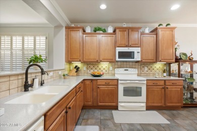 This gated 55+ community is nestled within the mountains and on The Golf Club At Johnson Ranch in Arizona - for sale on GolfHomes.com, golf home, golf lot