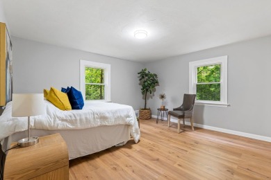 Nestled on a quiet dead-end street, this beautifully updated on Bolduc Park Golf Course in New Hampshire - for sale on GolfHomes.com, golf home, golf lot