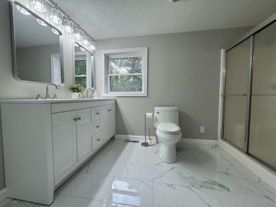 Nestled on a quiet dead-end street, this beautifully updated on Bolduc Park Golf Course in New Hampshire - for sale on GolfHomes.com, golf home, golf lot