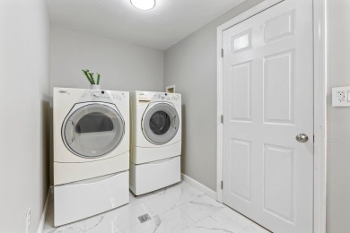 Nestled on a quiet dead-end street, this beautifully updated on Bolduc Park Golf Course in New Hampshire - for sale on GolfHomes.com, golf home, golf lot