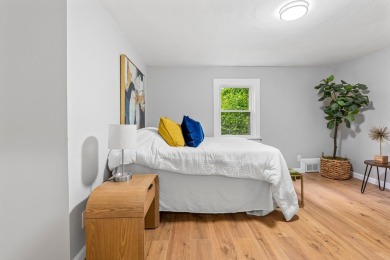 Nestled on a quiet dead-end street, this beautifully updated on Bolduc Park Golf Course in New Hampshire - for sale on GolfHomes.com, golf home, golf lot