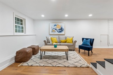 Nestled on a quiet dead-end street, this beautifully updated on Bolduc Park Golf Course in New Hampshire - for sale on GolfHomes.com, golf home, golf lot