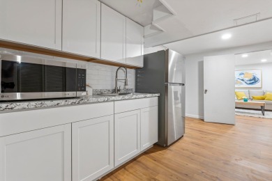 Nestled on a quiet dead-end street, this beautifully updated on Bolduc Park Golf Course in New Hampshire - for sale on GolfHomes.com, golf home, golf lot