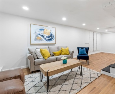 Nestled on a quiet dead-end street, this beautifully updated on Bolduc Park Golf Course in New Hampshire - for sale on GolfHomes.com, golf home, golf lot