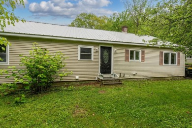 Nestled on a quiet dead-end street, this beautifully updated on Bolduc Park Golf Course in New Hampshire - for sale on GolfHomes.com, golf home, golf lot