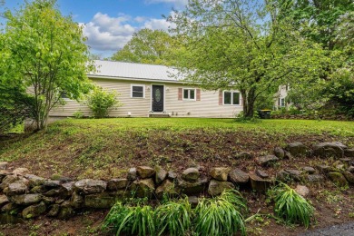 Nestled on a quiet dead-end street, this beautifully updated on Bolduc Park Golf Course in New Hampshire - for sale on GolfHomes.com, golf home, golf lot