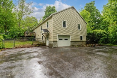 Nestled on a quiet dead-end street, this beautifully updated on Bolduc Park Golf Course in New Hampshire - for sale on GolfHomes.com, golf home, golf lot