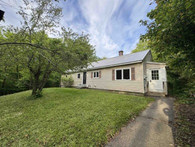 Nestled on a quiet dead-end street, this beautifully updated on Bolduc Park Golf Course in New Hampshire - for sale on GolfHomes.com, golf home, golf lot