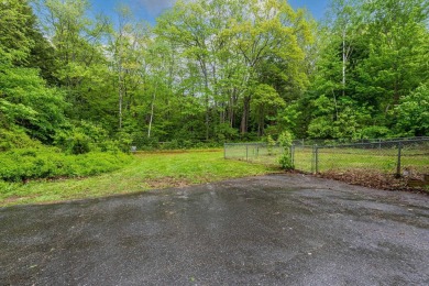 Nestled on a quiet dead-end street, this beautifully updated on Bolduc Park Golf Course in New Hampshire - for sale on GolfHomes.com, golf home, golf lot