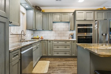 Step into easy, first floor living with fairway views that feel on Myrtlewood Golf Course and Club  in South Carolina - for sale on GolfHomes.com, golf home, golf lot