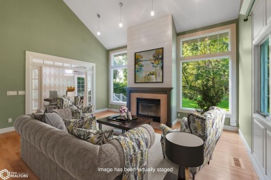 Nestled on over an acre on a scenic private drive, this on Highland Park Golf Course in Iowa - for sale on GolfHomes.com, golf home, golf lot