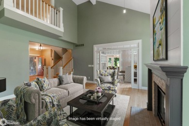 Nestled on over an acre on a scenic private drive, this on Highland Park Golf Course in Iowa - for sale on GolfHomes.com, golf home, golf lot