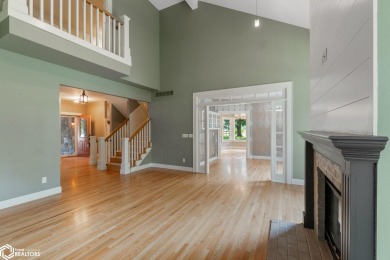 Nestled on over an acre on a scenic private drive, this on Highland Park Golf Course in Iowa - for sale on GolfHomes.com, golf home, golf lot