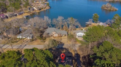 This charming waterview 1685 square foot modified A-Frame with a on Hide-A-Way Lake Golf Course in Texas - for sale on GolfHomes.com, golf home, golf lot