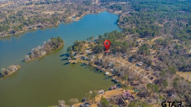 This charming waterview 1685 square foot modified A-Frame with a on Hide-A-Way Lake Golf Course in Texas - for sale on GolfHomes.com, golf home, golf lot