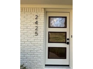 Welcome home! This beautifully remodeled 3-bedroom, 2 bath home on East Lake Golf Club in Georgia - for sale on GolfHomes.com, golf home, golf lot