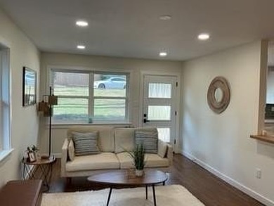 Welcome home! This beautifully remodeled 3-bedroom, 2 bath home on East Lake Golf Club in Georgia - for sale on GolfHomes.com, golf home, golf lot