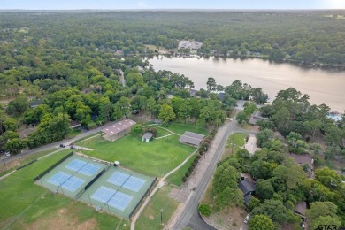 This charming waterview 1685 square foot modified A-Frame with a on Hide-A-Way Lake Golf Course in Texas - for sale on GolfHomes.com, golf home, golf lot