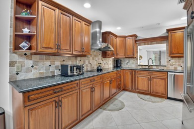 Spacious & Elegant 3BR + Den, 2BA with Lake Views in Hunters on  in Florida - for sale on GolfHomes.com, golf home, golf lot