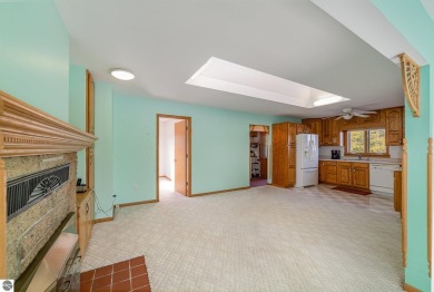 Lakefront home with 2 bedrooms, 3 full bathrooms, and over 2600 on Eagle Glen Golf Course in Michigan - for sale on GolfHomes.com, golf home, golf lot