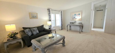 This fully furnished 1995 2-bed, 2-bath waterfront home in the on The Club At Pointe West in Florida - for sale on GolfHomes.com, golf home, golf lot