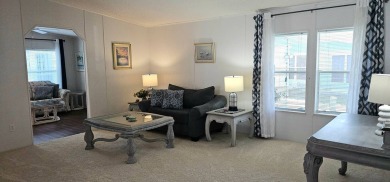 This fully furnished 1995 2-bed, 2-bath waterfront home in the on The Club At Pointe West in Florida - for sale on GolfHomes.com, golf home, golf lot
