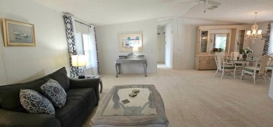 This fully furnished 1995 2-bed, 2-bath waterfront home in the on The Club At Pointe West in Florida - for sale on GolfHomes.com, golf home, golf lot