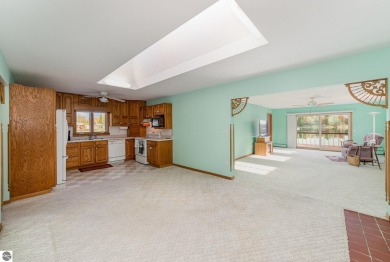 Lakefront home with 2 bedrooms, 3 full bathrooms, and over 2600 on Eagle Glen Golf Course in Michigan - for sale on GolfHomes.com, golf home, golf lot