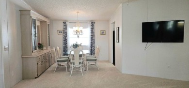 This fully furnished 1995 2-bed, 2-bath waterfront home in the on The Club At Pointe West in Florida - for sale on GolfHomes.com, golf home, golf lot