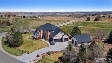 Located in Highland Hills, this exquisite property is nestled on Ptarmigan Golf Course in Colorado - for sale on GolfHomes.com, golf home, golf lot