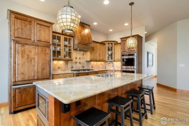 Located in Highland Hills, this exquisite property is nestled on Ptarmigan Golf Course in Colorado - for sale on GolfHomes.com, golf home, golf lot