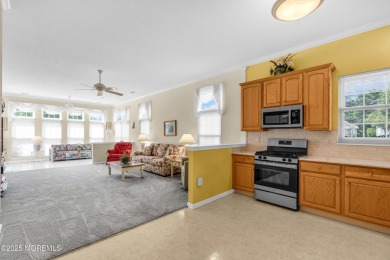 This Extended Elm with 4 Season Sunroom Sits On a Large Corner on Four Seasons Spa and Country Club in New Jersey - for sale on GolfHomes.com, golf home, golf lot