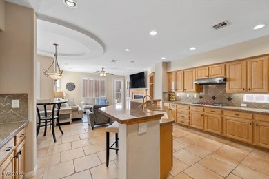 Welcome to an exceptional single-story residence set within one on TPC Las Vegas in Nevada - for sale on GolfHomes.com, golf home, golf lot