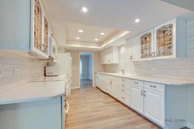 MOVE-IN READY TWO-STORY COLONIAL SITUATED ON A QUIET CUL-DE-SAC on Sportsmans Country Club in Illinois - for sale on GolfHomes.com, golf home, golf lot